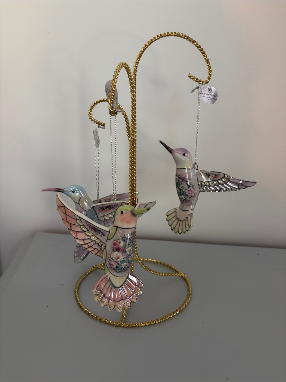 Set one Bradford Lena Lin’s Precious Jewels hummingbird ornaments. Three total